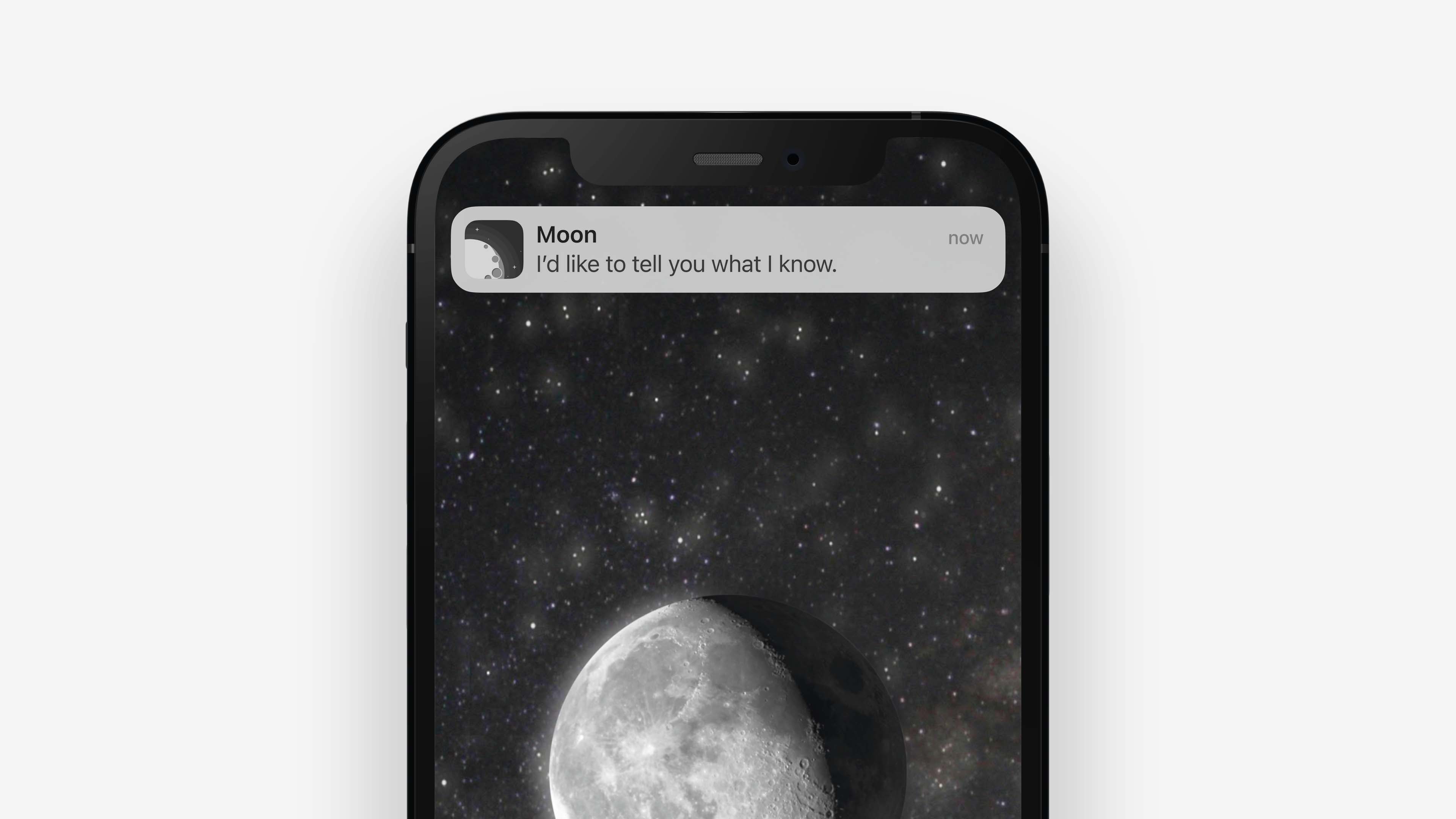 image of an apple phone with the app moon. there is a moon in shadow against a starry sky at the main focal image, with a grey notification from the app that says 